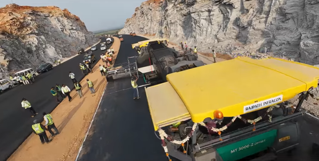 NHAI Creates History with Two Guinness World Records in Continuous Bituminous Concrete Paving